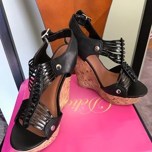 Brand new wedge sandal by Delicioso